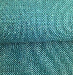 Meubelstof Verona Turquoise fraai geweven sterke linnenlook met speelse contrasterende puntjes, geschikt voor meubelbekleding.